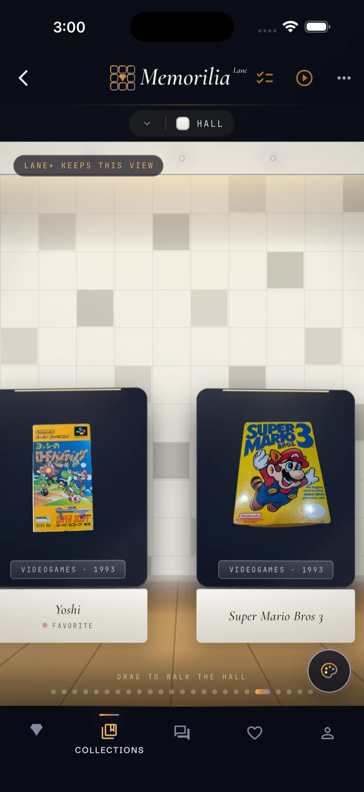 Hall display with boxed games standing on a lit shelf